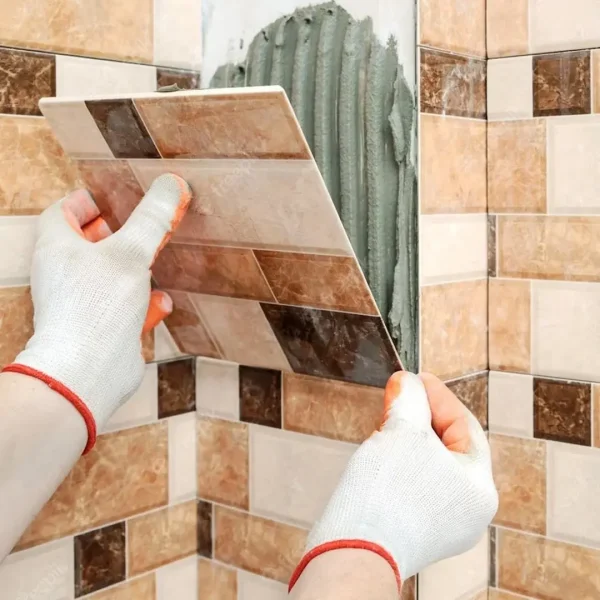 Expert helping customer select tiles and granite at the best granite shop in Mahagun Puram Ghaziabad